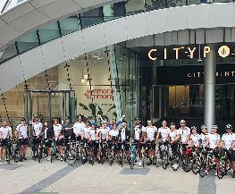 Simmons Team Completes 126KM Charity Bike Ride in Honour of Former Associate