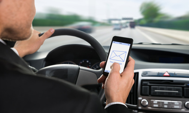 Work Pressures Might be Propelling Distracted Driving Rates