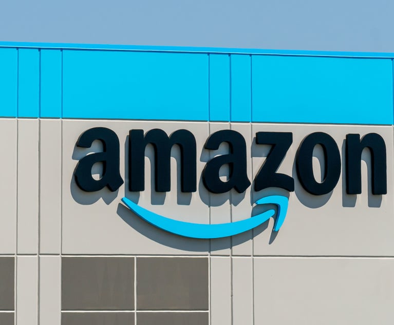 KENOSHA, WI,USA - JUNE 19, 2021 - Amazon warehouse facility exterior and trademark logo. Credit: Ken Wolter/Adobe Stock