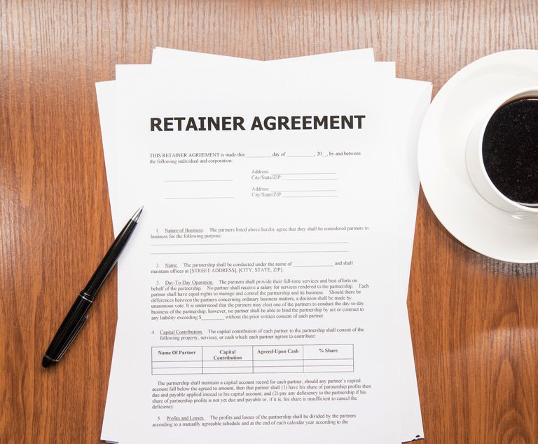 Retainer agreement. Credit: de-focus/Shutterstock.com