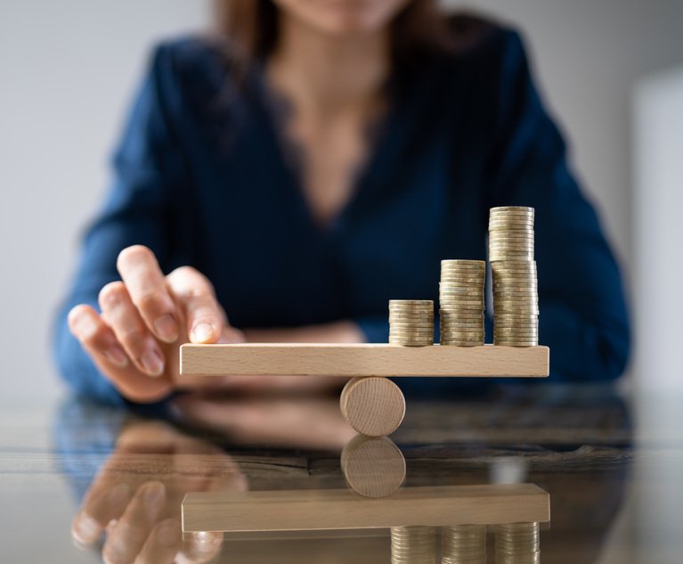 Balance coins on seesaw