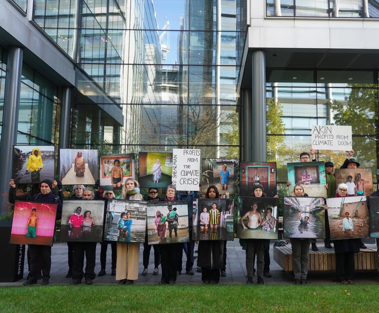 Climate Groups Demonstrate Outside A&O Shearman and Akin London Offices