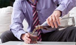 Big Law Leader Shares Struggles with Alcoholism Challenges for Profession