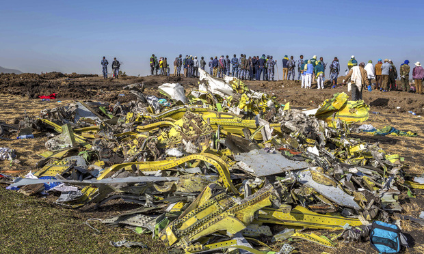 Wreckage is piled at the crash scene of an Ethiopian Airlines flight crash near Bishoftu, or Debre Zeit, south of Addis Ababa, Ethiopia, March 11, 2019. The crash killed 157 people. (AP Photo/Mulugeta Ayene)
