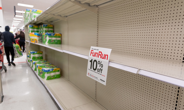 At Daly City's Target store in the Bay Area store shelves are picked over and deserted. Including signs posted on the Pharmacy stating no masks or hand sanitizer, gloves or alcohol available. (Photo: Jason Doiy/ALM)