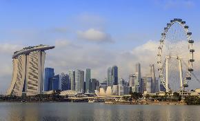 Simmons boosts Singapore offering with local law tie up