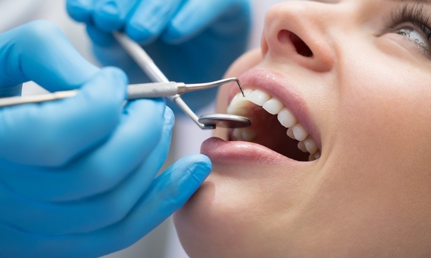 DLA Piper and Baker McKenzie brush up for 300m dental practice sale
