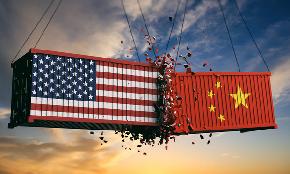 US Companies Not Leaving China but Confidence Hits New Lows