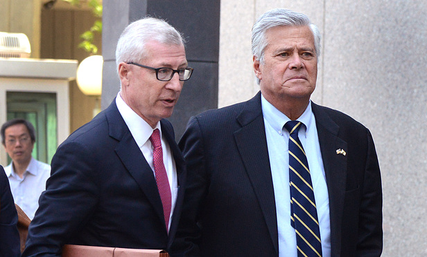 Dean Skelos, right, and attorney Robert Gage Jr. leave federal court after Skelos' May 2016 sentencing.