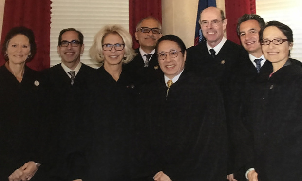 In an Apparent First Asian American Justices Hear High Court Cases