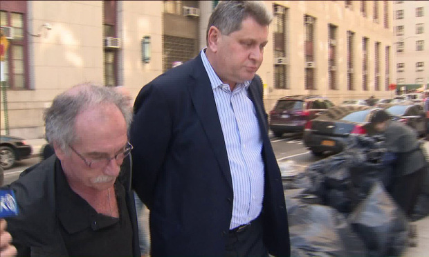 Former New York State Assemblyman Alec Brook-Krasny is escorted to his arraignment in Manhattan on Thursday, April 13, 2017.