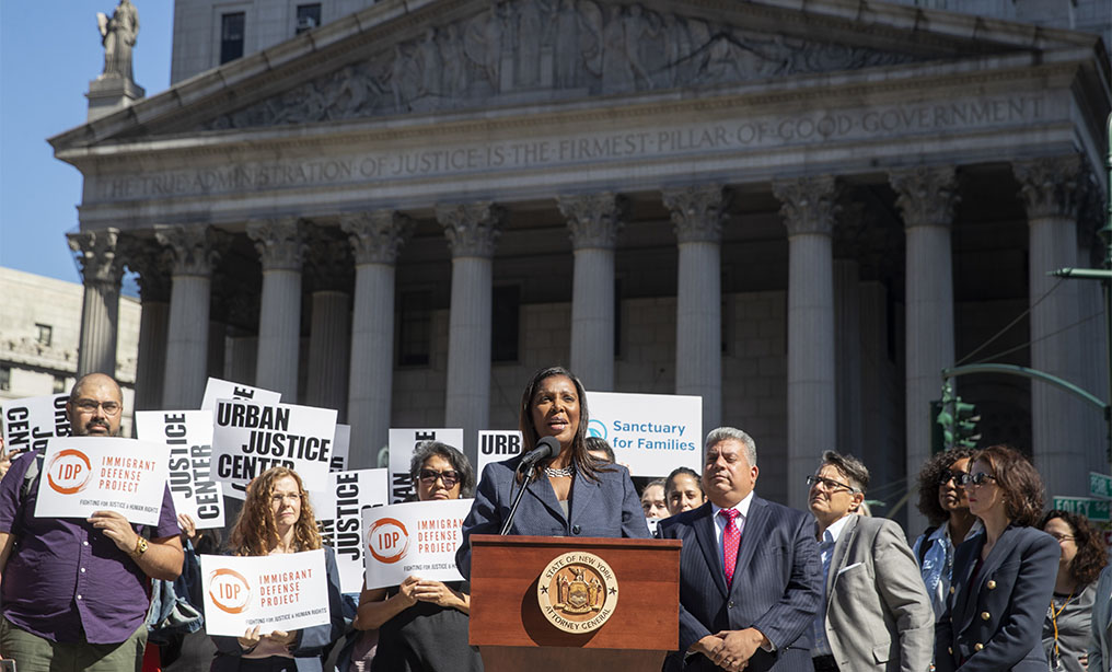 State Attorney General Letitia James, center, is joined by Brooklyn District Attorney Eric Gonzalez, center right, as she speaks during a news conference on Wednesday, Sept. 25, in New York. Photo: Mary Altaffer/AP