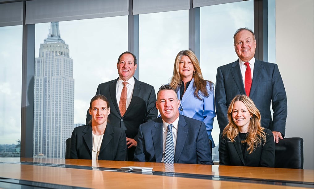 Seated, from left, partners Julie Cohen, Robert Fumerton and Jocelyn Strauber; standing, from left, partners Scott Musoff, Susan Saltzstein and Jay Kasner.