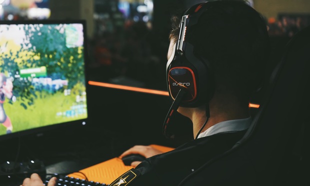 A member of the U.S Army E Sports team playing video games . Photo: U.S Army