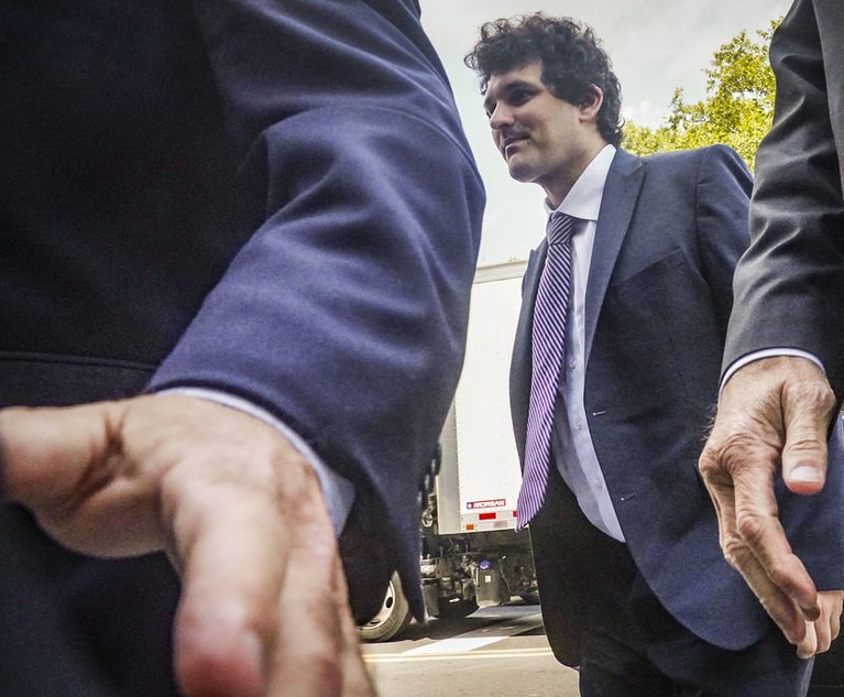 Sam Bankman Fried Leaves Courtroom in Handcuffs Lawyers Say They Will Appeal Bail Revocation