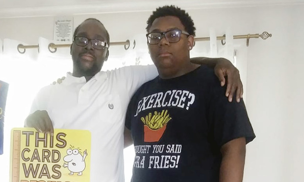 Wayne World (left) with his son soon after his May release from the Osborn Correctional Institute.