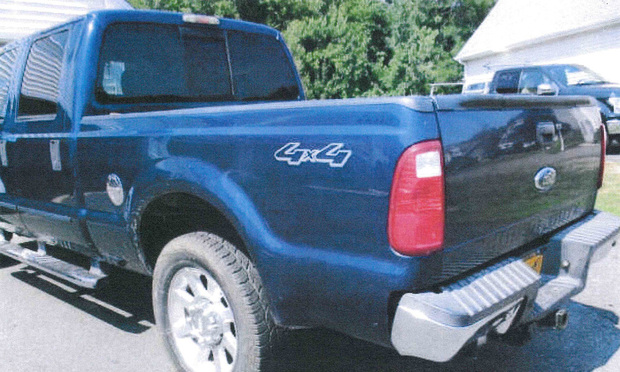 Gregory Croze suffered injuries to his lower back, left shoulder and neck after his blue Ford F250 was rear-ended.