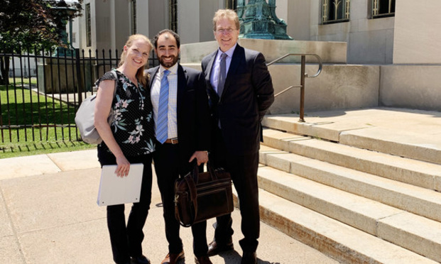 From left to right are former DoubleTree by Hilton Hotel employee Danelle Martin and Hayber Law Firm attorneys Thomas Durkin and Richard Hayber.