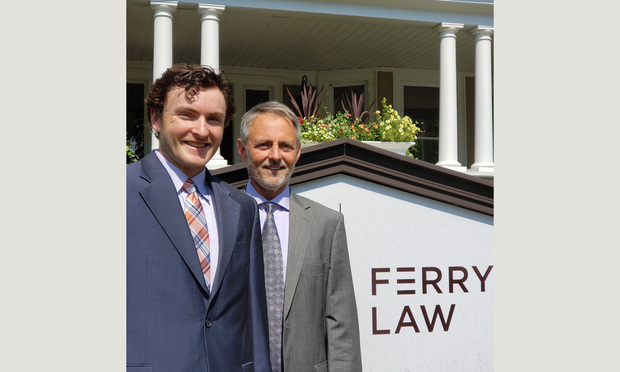Sam Martin (left) and Attorney Kevin Ferry (right), the owner of the Law Office of Kevin C. Ferry in New Britain. Martin, an intern, assisted Ferry in the firm's representation of a woman who received a $356,976 arbitration award following a car accident.