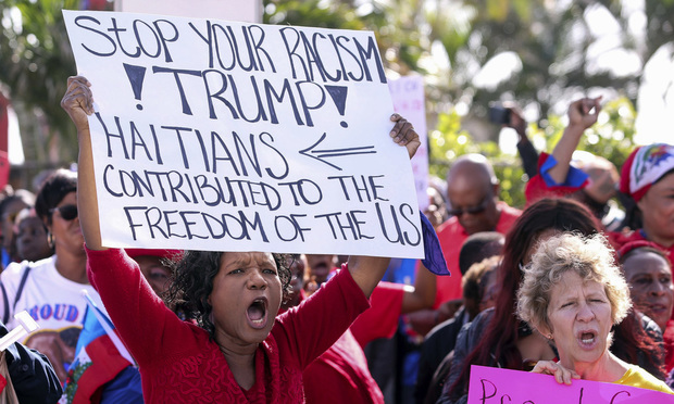 Haitian community supporters in West Palm Beach, Fla., to protest recent remarks made by President Donald Trump about Haiti. (Damon Higgins/Palm Beach Post via AP, File)