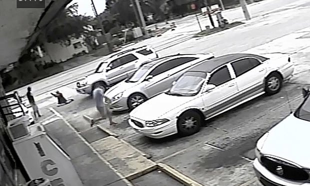 In this July 19 file frame from surveillance video released by the Pinellas County Sheriff's Office, Markeis McGlockton, far left, is shot by Michael Drejka during an altercation in the parking lot of a convenience store in Clearwater, Florida.  Credit: Pinellas County Sheriff's Office via AP, File