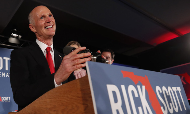 Republican Senate candidate Rick Scott smiles as he speaks to supporters at an election watch party Nov. 7 in Naples. Photo by Wilfredo Lee/AP