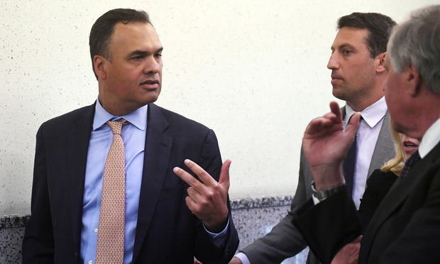 Attorneys William Burck, left, Alex Spiro, center, and Jack Goldberger, part of the defense team for New England Patriots owner Robert Kraft, emerge from a courtroom at the Palm Beach County Courthouse in West Palm Beach, (Patrick Dove/TCPalm.com via AP, Pool)