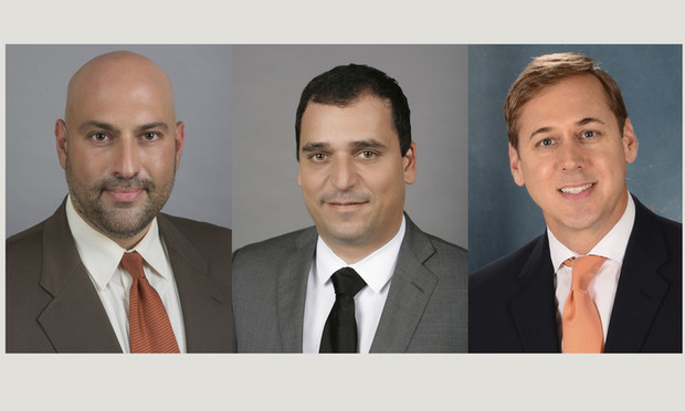 Marcus & Millichap senior associates Alejandro D'Alba and David Cohen as well as first vice president investments Scott Sandelin, all based in Miami. 