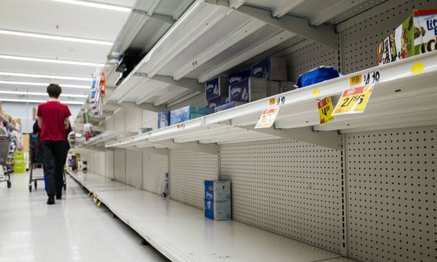 Nearly empty shelves in the cleaning products and disposable paperware aisles at a Giant supermarket in Baltimore, MD, due to the spread of the Coronavirus (Covid-19), on Thursday, March 12, 2020.
