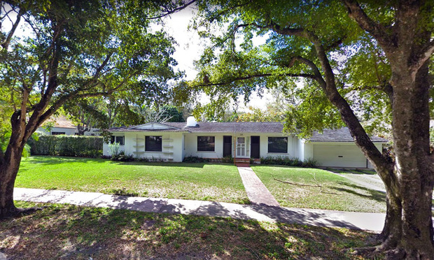 Ranch-style single-family house at 1208 Asturia Ave. in Coral Gables.