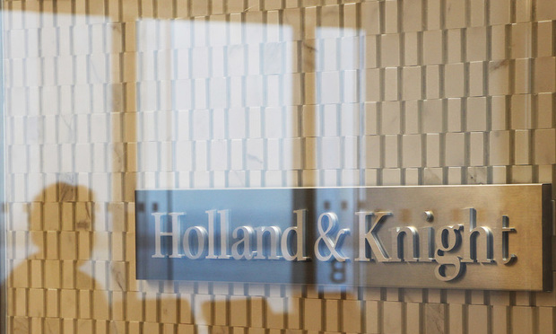 Holland & Knight sign