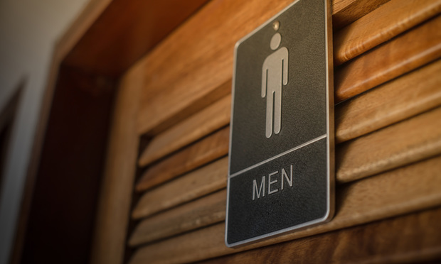 A male restroom sign
