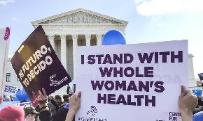 'Compelled to Come Forward': Female Lawyers Urge Justices to Protect Abortion Rights