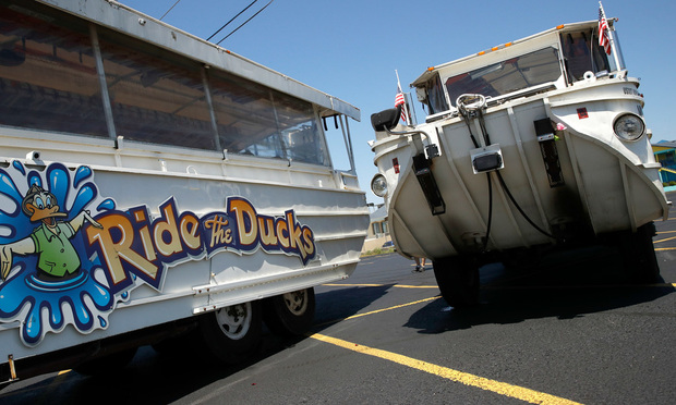 Duck boats sit idle in the parking lot of Ride the Ducks on July 21, in Branson, Missouri. 