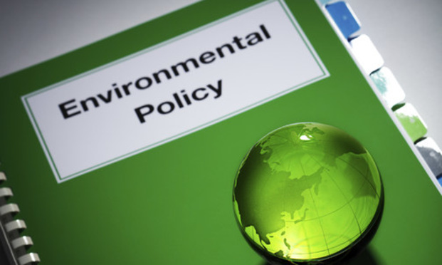 environmental policy green book glass globe