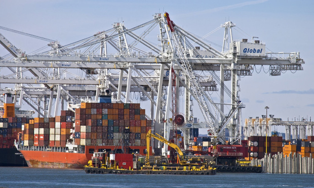 Waterfront shipping cranes