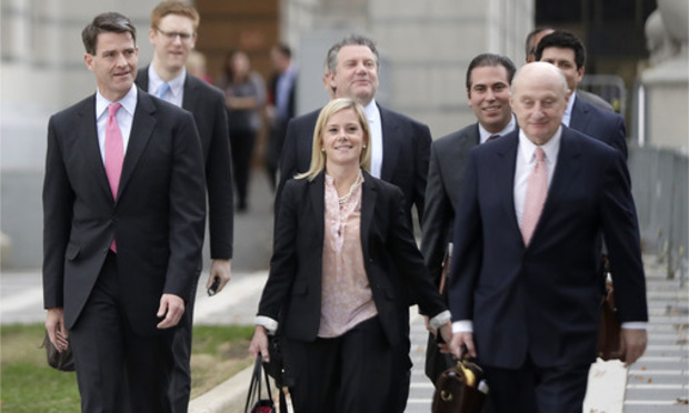 Bill Baroni Jr., left, New Jersey Gov. Chris Christie's former top appointee at the Port Authority of New York and New Jersey, and Bridget Kelly, center, Christie's former deputy chief of staff, depart from Martin Luther King, Jr., Federal Court, Thursday, Nov. 3, 2016, in Newark, N.J.
