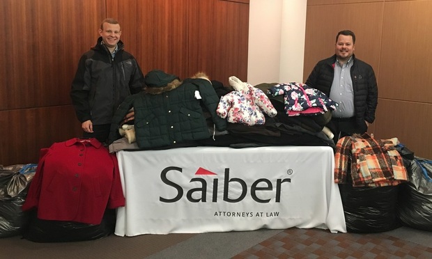 Saiber Donates Over 80 Winter Coats to Jersey Cares Coat Drive