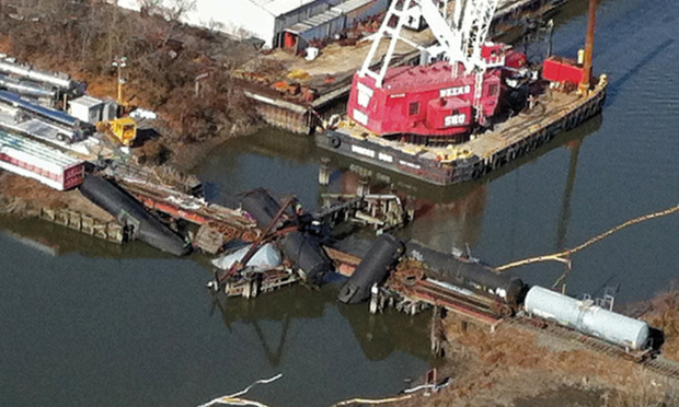 A 150-ton crane from Weeks Marine, Inc., is positioned by response crews at the site of the East Jefferson Street Bridge Derailment in Paulsboro, N.J. - U.S. Coast Guard photo