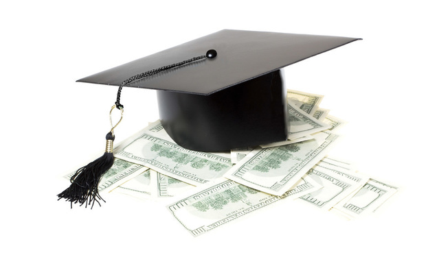Graduation cap and money - Photo by Irina Kozhemyakina
