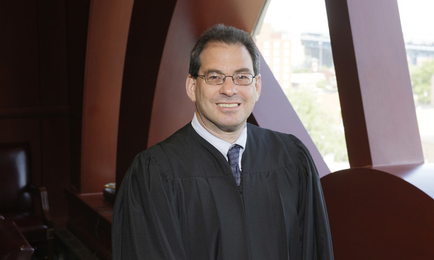 Magistrate Judge Joel Schneider.