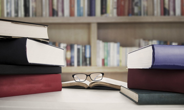 books, reading glasses - Copyright: Paulus Rusyanto