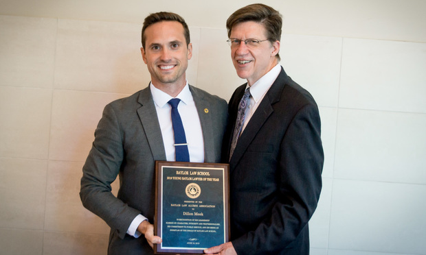 YOUNG LAWYER OF THE YEAR: Shown, from left: Dillon Meek receives Baylor Law School's Young Lawyer of the Year from Baylor Law Dean Brad Toben, at the Waco city council meeting at Waco Convention Center's Bosque Theater, on June 18, 2019.