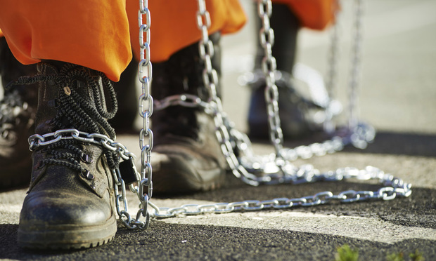 inmates boots chained