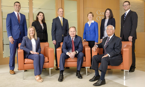 General Litigation finalist: Conrad O'Brien. Standing, left to right, Christopher Lucca, Lorie Dakessian, Kevin Kent, Patricia Hamill, Meghan A. Farley and Joseph Jesiolowski. Seated, left to right, Stacy Orvetz, Nicolas Centrella and Louis Fryman.