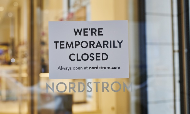 "Temporarily closed" sign in the window of Nordstrom