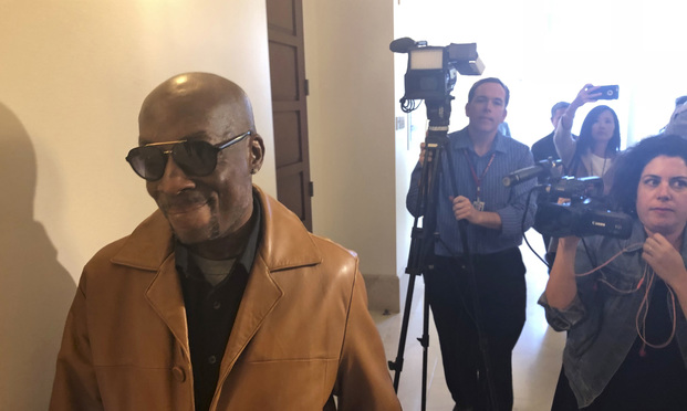 In this Oct. 10, 2018 file photo, plaintiff DeWayne Johnson, a school groundskeeper who says Roundup weed-killer caused his cancer, leaves a courtroom in San Francisco. Agribusiness giant Monsanto is appealing a $78 million verdict in favor of a dying California man who said the company's widely used Roundup weed killer was a major factor in his cancer. The company filed a notice of appeal Tuesday, Nov. 20, 2018, in San Francisco Superior Court challenging the August jury verdict in favor of Johnson. (AP Photo/Paul Elias, File)