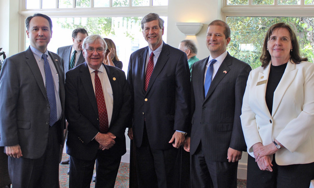 Justice Keith Blackwell (from left) and Chief Justice Harris Hines of the Georgia Supreme Court, Joel O. Wooten, Justice Nels Peterson, and Tee Barnes. (Courtesy photo)