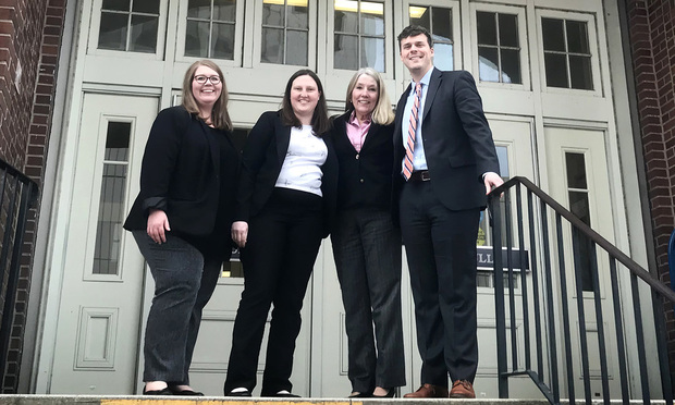 Clerk Caroline Scalf (from left), paralegal Jessica Peed, Kathy McArthur, and Jordan Josey of the McArthur Law Firm, outsiie the Bibb County Courthouse in Macon, Georgia (Courtesy photo)