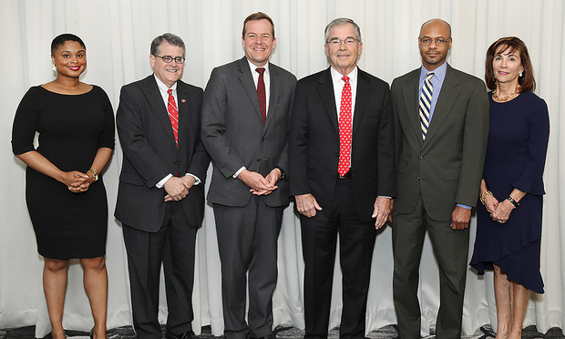 UGA President Jere W. Morehead (second from left) and School of Law Dean Peter B. “Bo” Rutledge (third from left) presented honors to: Young Alumni/Alumnae of Excellence Award winner Mercedes G. Ball (left) and Distinguished Service Scroll Award winners William Porter “Billy” Payne (third from right), Harold D. Melton (second from right) and Kathelen Van Blarcum Amos.